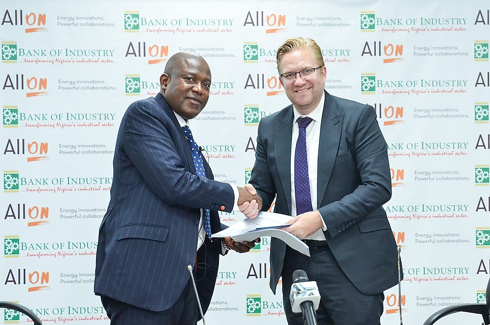 Mr Olukayode Pitan MDCEO Bank of Industry (L) Dr Wiebe Boer CEO All On