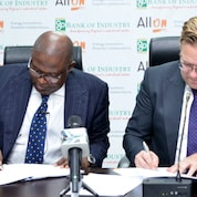 Mr Olukayode Pitan MDCEO Bank of Industry (L) Dr Wiebe Boer CEO All On