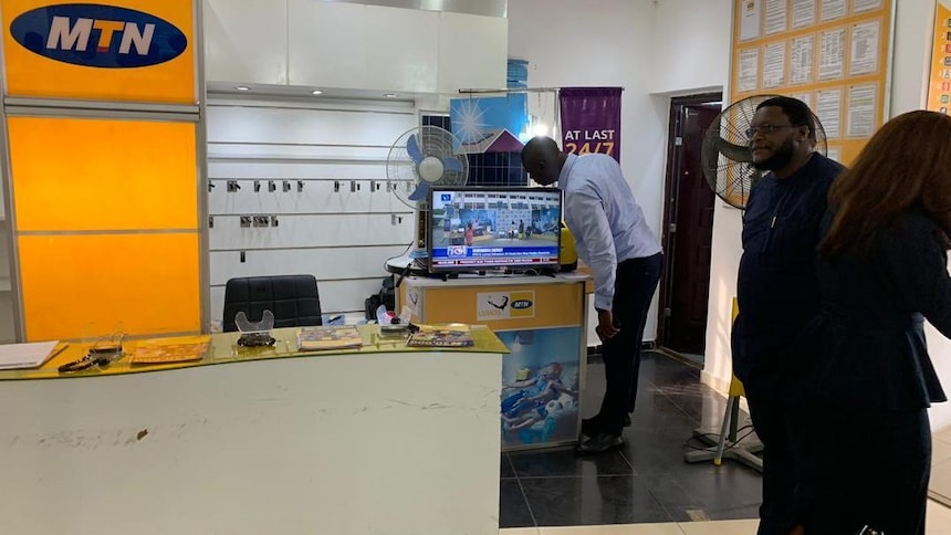 all on staff engaging with lumos nigeria agents at one of their outlets in ekiti state