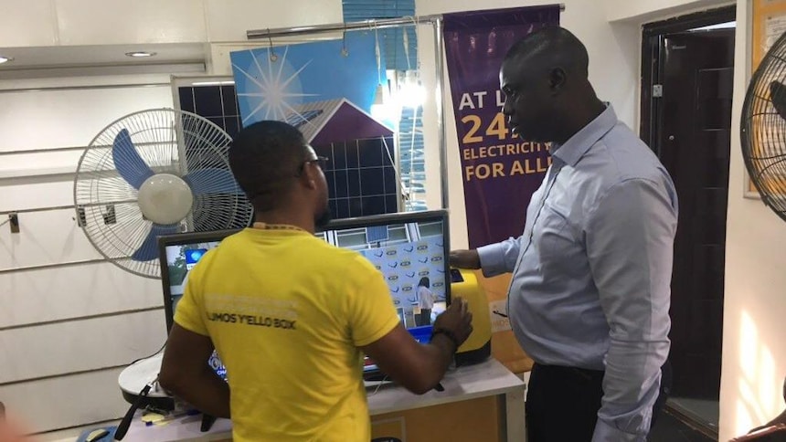 all on staff engaging with lumos nigeria agents at one of their outlets in ekiti state