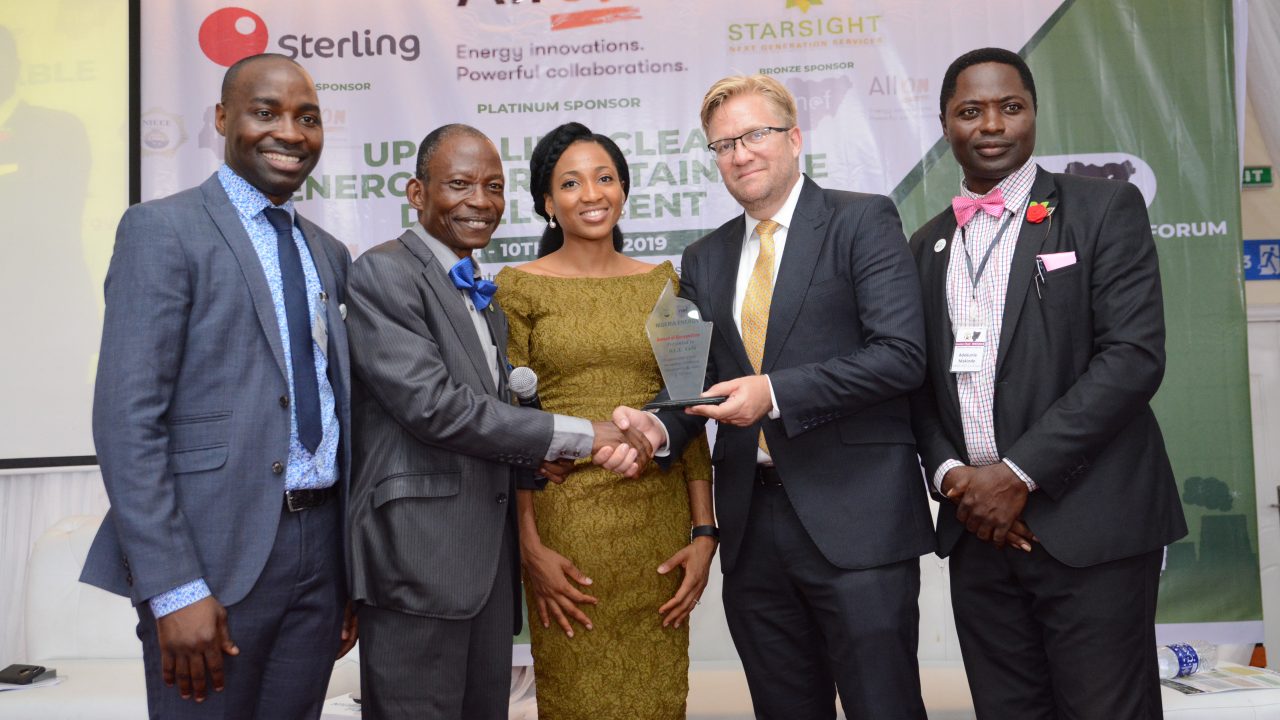 All On receives a recognition award from the NEF team