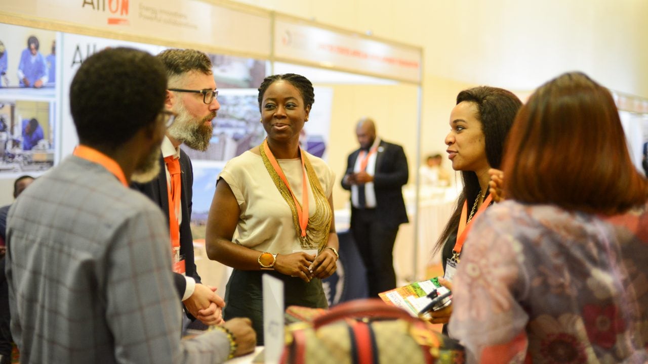 Attendees networking at the event