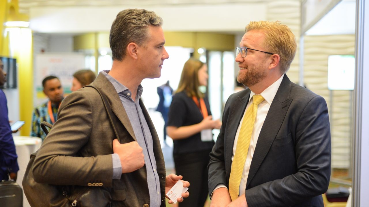 Attendees network at the event