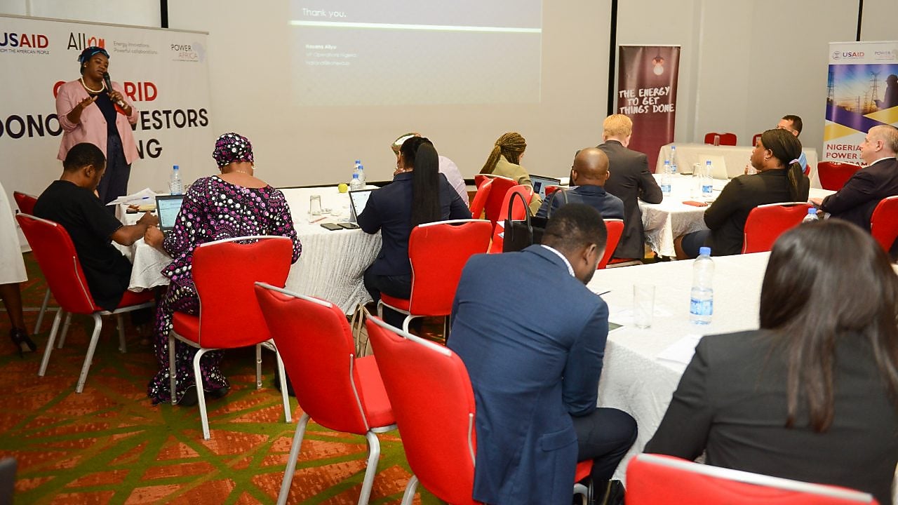 Hasan Aliyui giving a presentation at the event