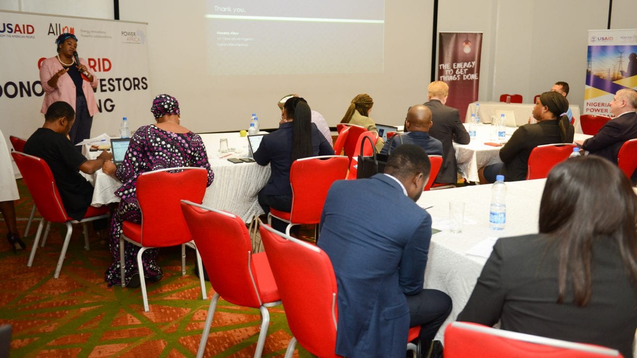 Hasan Aliyui giving a presentation at the event