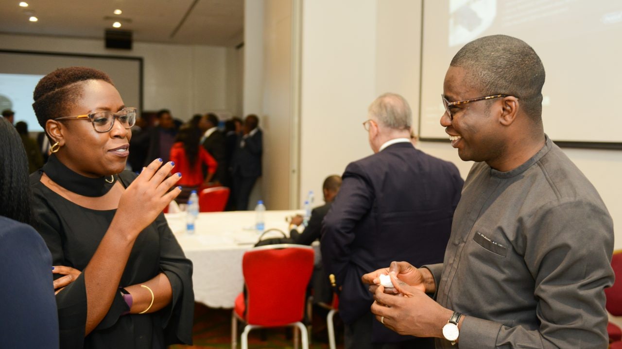 Attendees networking at the Investors meeting