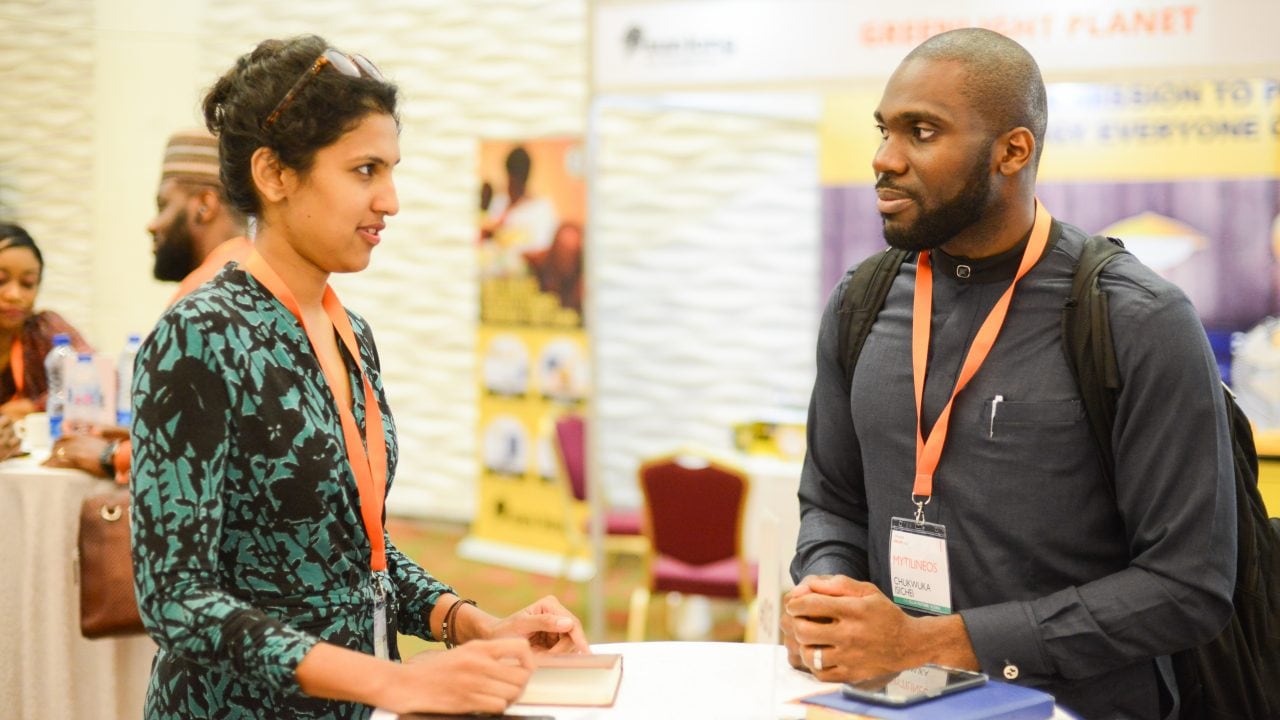 Attendees networking at the event