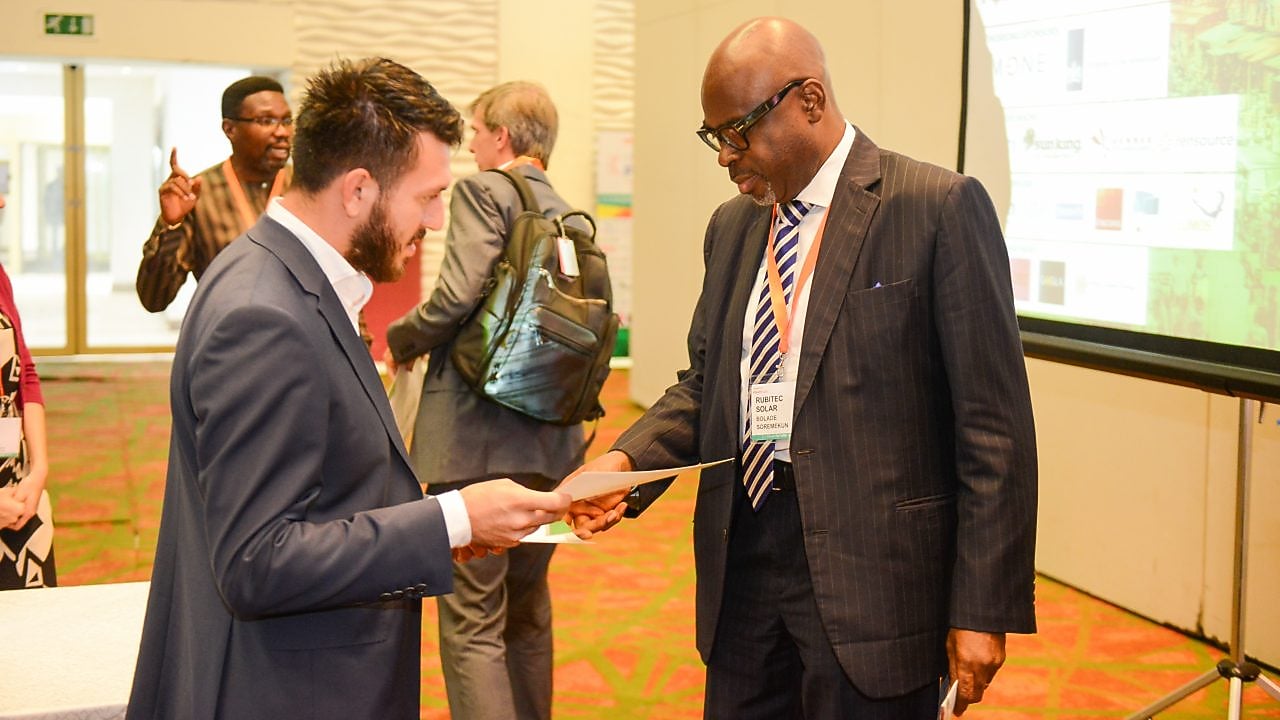 Guests networking at the event.