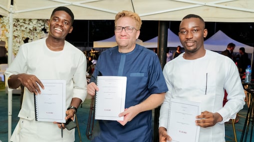 three men showing agreements